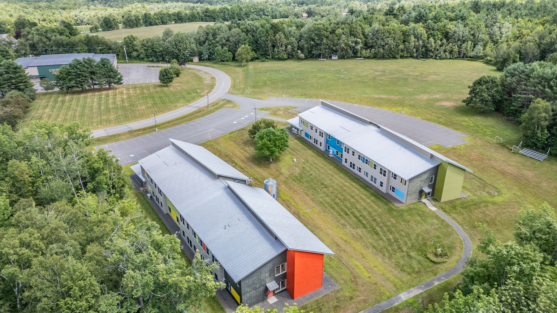 The campus buildings and access road from the air